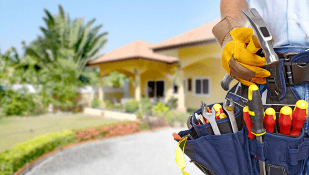Home maintenance technician working at a residential property